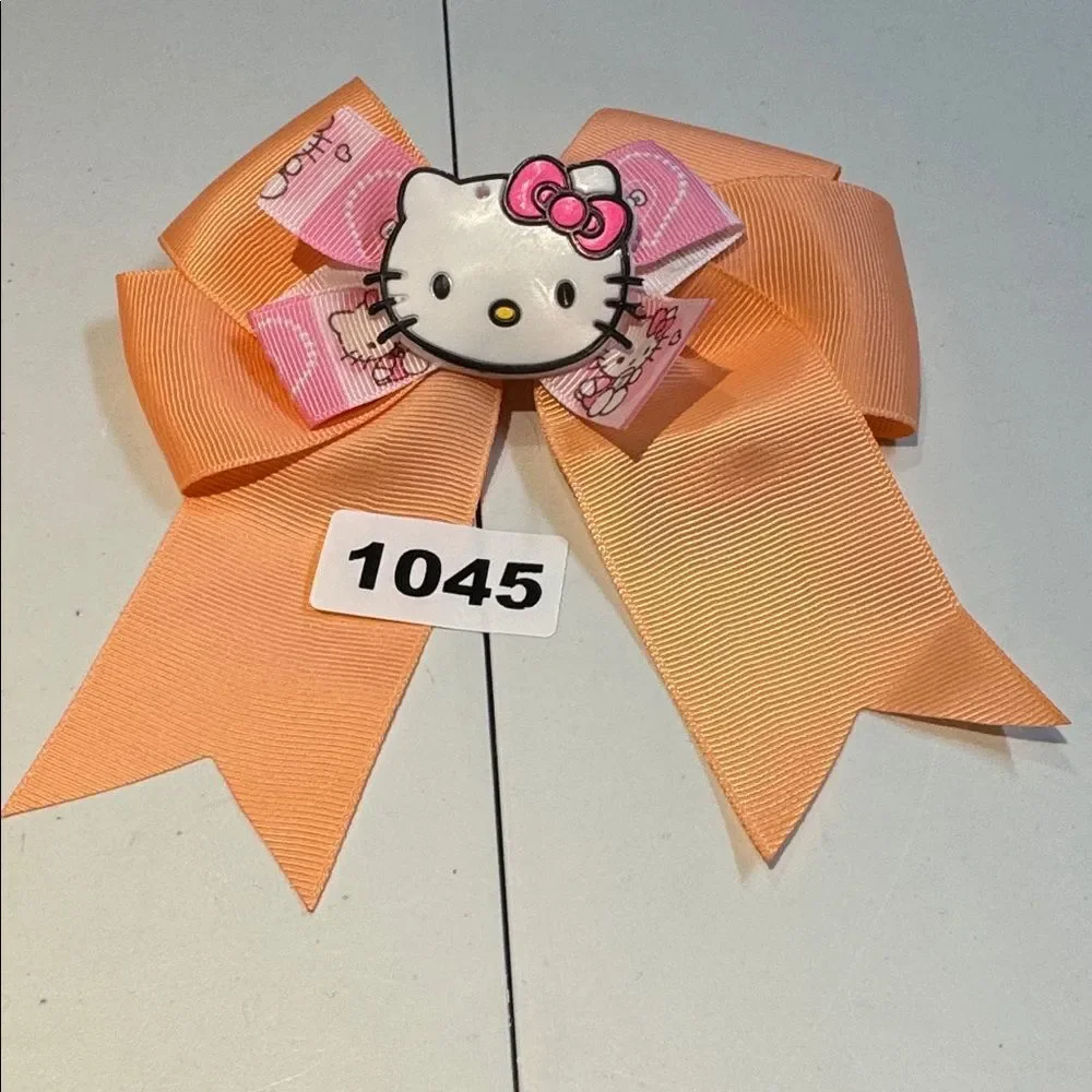 1045 Peach Color Hello Kitty Aligator Clip Hair Bow
